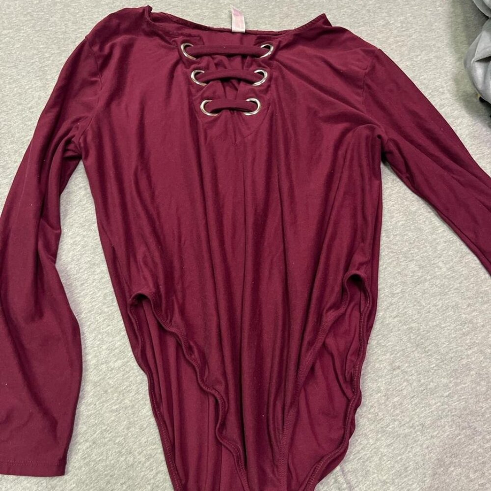 Burgundy long sleeve bodysuit with lace-up detail